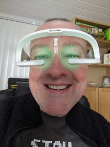 Richard Tubb wearing Re-Timer - Light Therapy Glasses